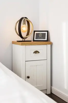 a white cabinet with a mirror on top of it at AGIA 3-comfort apartment Sofia in Sofia