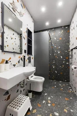 a bathroom with a sink and a toilet at Space art apart in Sofia