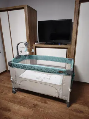 a dresser with a television on top of it at Tsvetanov Apartment in Blagoevgrad