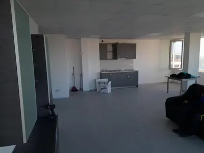 a large room with a kitchen and a living room at ApartBelisimo4 in Sofia