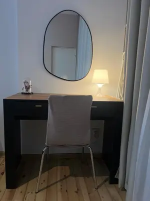a desk with a chair and a mirror at Florence family 2BDR Apt - min from Serdika w WiFi in Sofia