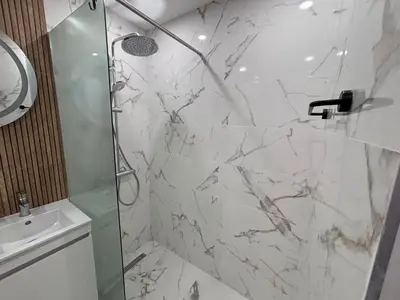 a bathroom with a shower and a sink at Боко 16-18 in Sofia