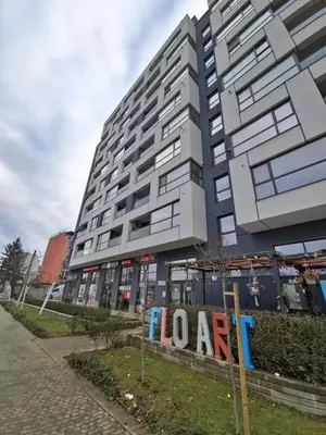a large building with a sign in front of it at The View Sofia in Sofia