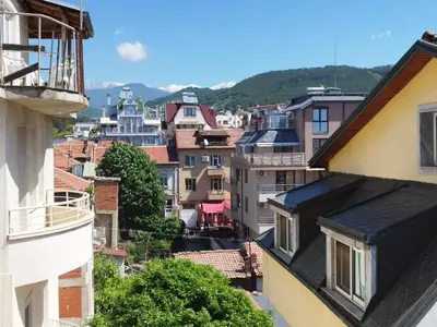 an overhead view of a city with buildings at Апартамент Сандански Център in Sandanski