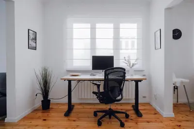 an office with a desk with a computer on it at Luminous Central Retreat Spacious 2BD Apartment by Flat Mаnager in Sofia