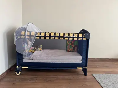 a blue bunk bed with a stuffed animal on it at Cozy place for nights in Plovdiv