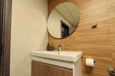 a bathroom with a sink and a mirror at Mirror Lake Studio in Samokov