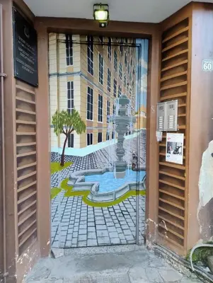 a glass door with a view of a building at Tiny studio in top center in Sofia