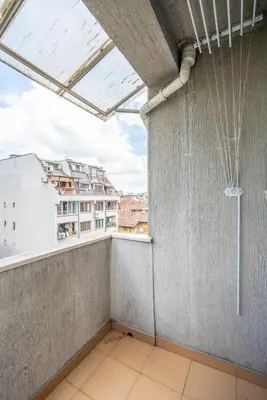 an apartment balcony with a shower and a window at Central Sofia Retreat in Sofia