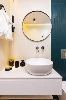 a bathroom with a white sink and a mirror at Happy People 2 BD, Central Plovdiv by Flat Mаnager in Plovdiv
