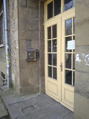 a door to a building with a box on it at просторен и уютен двустаен в Долен Лозенец - кварталът на артистите in Sofia