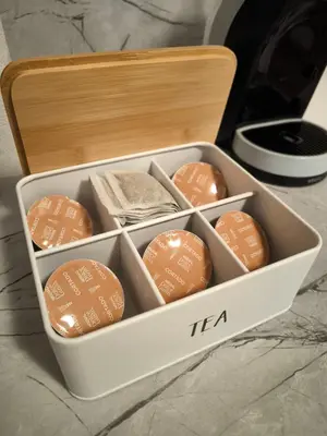 a white container filled with different types of cookies at NiSimo Apartment Grand Resort Pamporovo in Pamporovo
