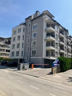 a large apartment building on the side of a street at Ira 28 in Sandanski