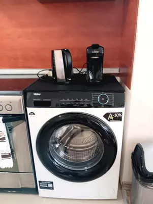 a washing machine with a camera on top of it at Double to bul Tsar Boris 3 in Sofia
