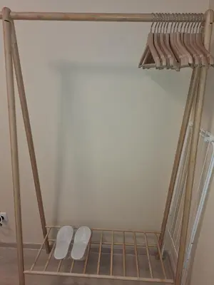a bunk bed in a room with two white shoes at Rila Park ap by the Slopes in Borovets