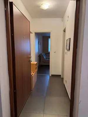 a hallway leading to a room with a door at Ritz in Sofia