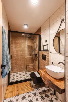 a bathroom with a tub and a sink and a shower at Уютно студио Verde Suites 14 in Blagoevgrad