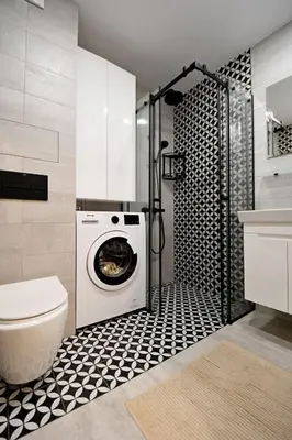 a bathroom with a toilet and a washer and dryer at MD Your Fancy Place in Sofia