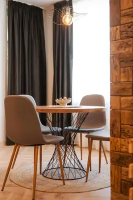 a dining room with a table and two chairs at Уютно Студио Verde Suites 07 in Blagoevgrad