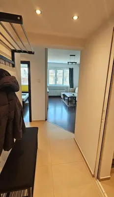 a view of a living room and a living room at Central Springs Apartment in Sofia
