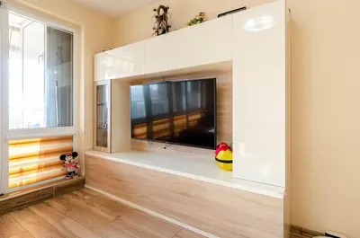 a living room with a large flat screen tv at Apart Center Nikola in Plovdiv