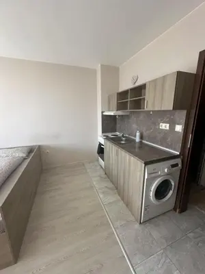 a kitchen with a sink and a washing machine at Good Morning in Sofia