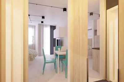 a kitchen and dining room with a table and chairs at Natan Royal in Sofia