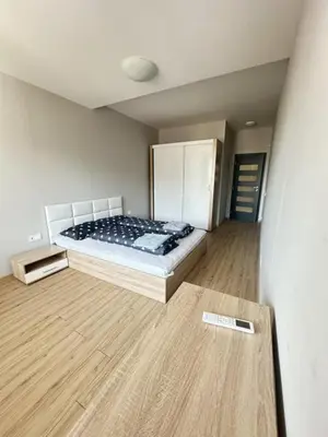 a bedroom with a bed in a room at No Remorse Tower & private parking in Sofia
