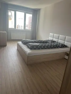 a bedroom with a bed in a room at No Remorse Tower & private parking in Sofia