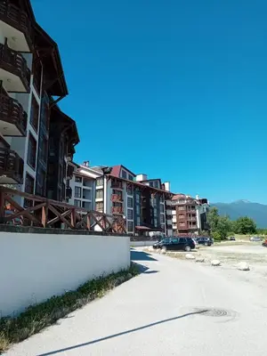a street in a city with apartment buildings at Belvedere Holiday Club Apartment 503 in Bansko
