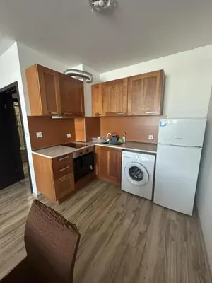 a kitchen with a washing machine and a washer at Luxury Cult & private parking in Sofia