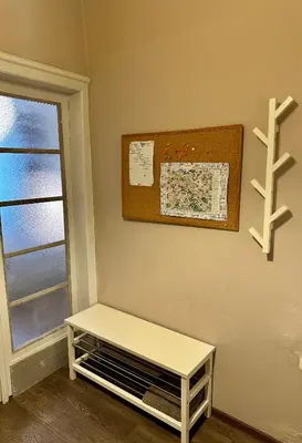 a white bench in a room with a window at Superb 2 Bedroom Top Central Apartment in Sofia