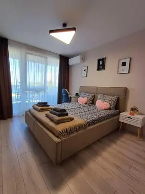 a bedroom with a large bed in a room at Your Home in Plovdiv with Free Private Parking in Plovdiv