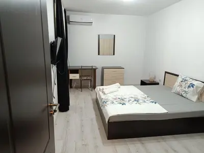 a small bedroom with a bed and a desk at One-Bedroom Apartment-14 Filip Makedonski 49B in Plovdiv