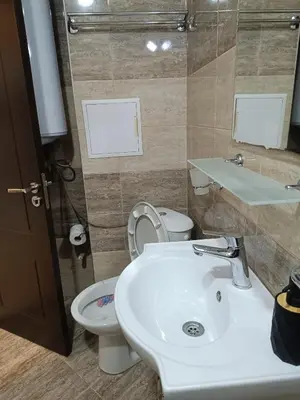 a bathroom with a sink and a toilet at One-Bedroom Apartment-14 Filip Makedonski 49B in Plovdiv