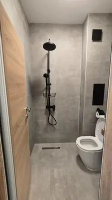 a bathroom with a toilet and a camera in it at Studio79 in Plovdiv