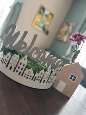 a birthday cake with a city on a table at Kamberovi house Kalofer in Kalofer