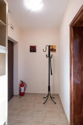 a room with a tripod in the corner of a room at Studio Talisman V in Sofia