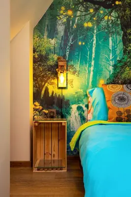 a bedroom with a large painting on the wall at Plovdiv Urban Gem 2BD Apartment by Flat Mаnаger in Plovdiv