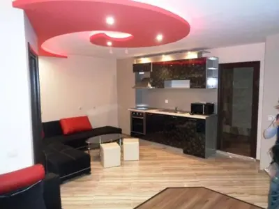 a living room with a couch and a kitchen at 
