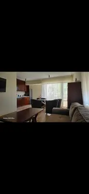 a living room with a couch and a table at Macedonia55 in Sandanski