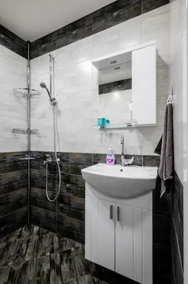 a bathroom with a sink and a shower at Central 1BD Next to Womens Market and Sofia's Gems by Flat Mаnаger in Sofia