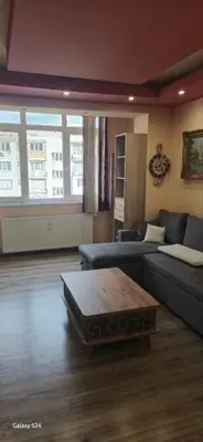 a living room with a couch and a coffee table at Heart of Pernik apartment 2 in Pernik