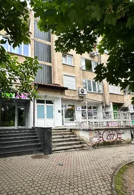 a building with stairs and a building with graffiti at Maison Colorée - Bright And Cozy Home by Metro And Mall in Sofia