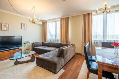 a living room with a couch and a table at Elegant Aristocratic 2 BDRM Flat, TOP Location in Sofia