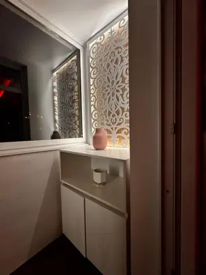 a room with a window with a vase on a shelf at Heaven on earth in Devin