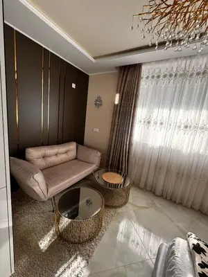 a living room with a couch and a table at Heaven on earth in Devin