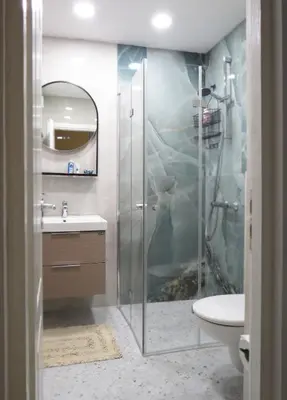 a bathroom with a shower and a toilet and a sink at Полименови in Sofia