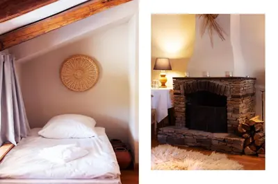 a bedroom with a bed and a fireplace at Хотел Гела in Gela