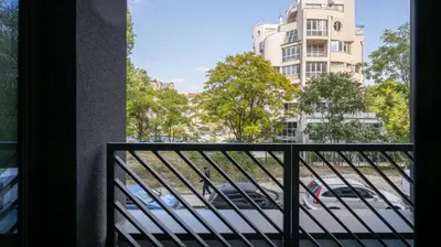 a balcony with a view of a building at Aviva City Stay by Flat Mаnager in Sofia